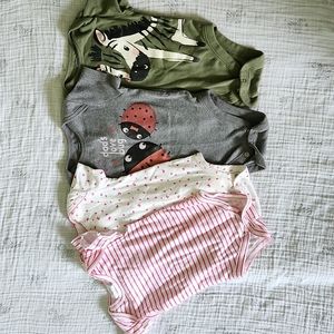 4 pack of girl's onesies 6-9m